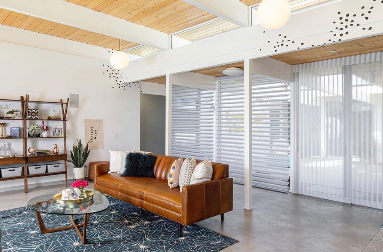 3. Combine Cognac Leather with a Graphic Rug