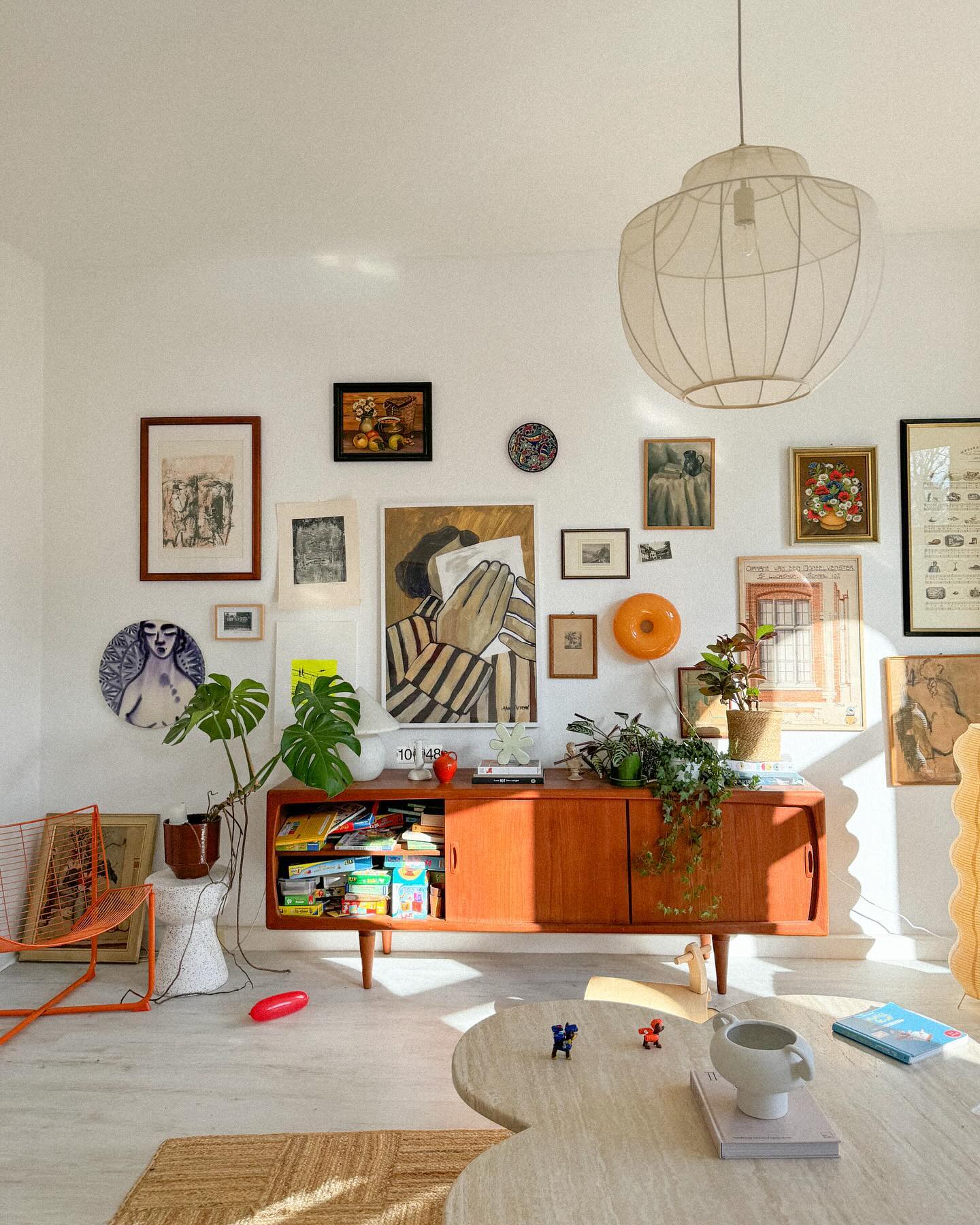 11. Build a Gallery Wall Above a Vintage-Style Sideboard