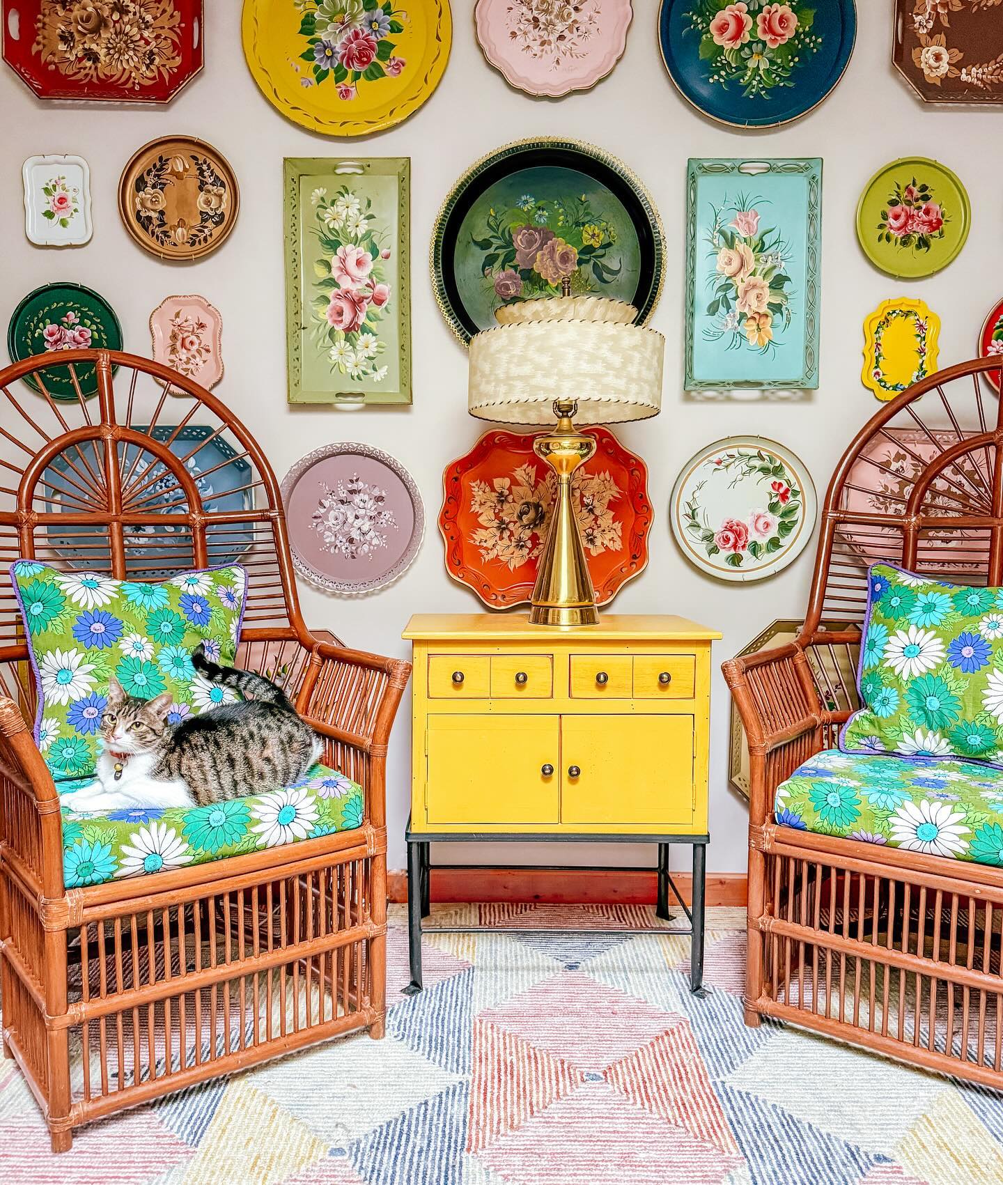 8. Refresh Rattan Chairs With Bold Floral Cushions