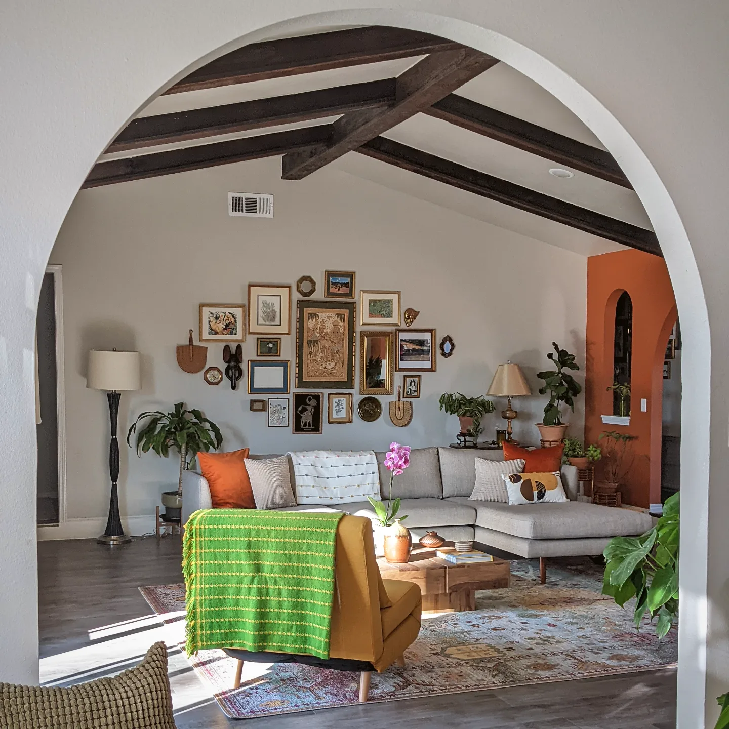 17. Carry Warm Accent Colors Through an Archway