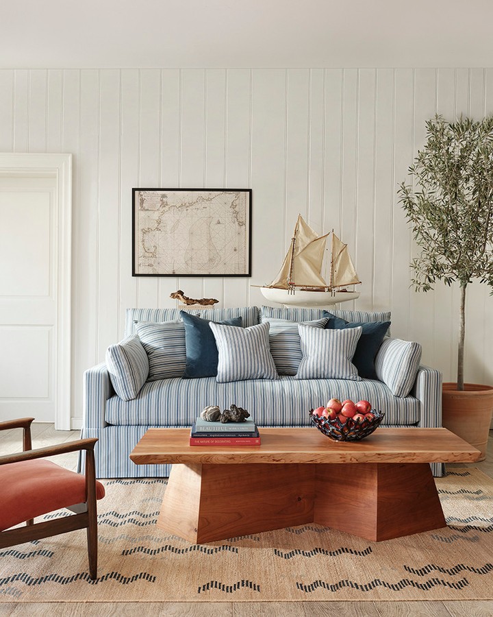 9. Choose a Skirted Sofa with Stripes