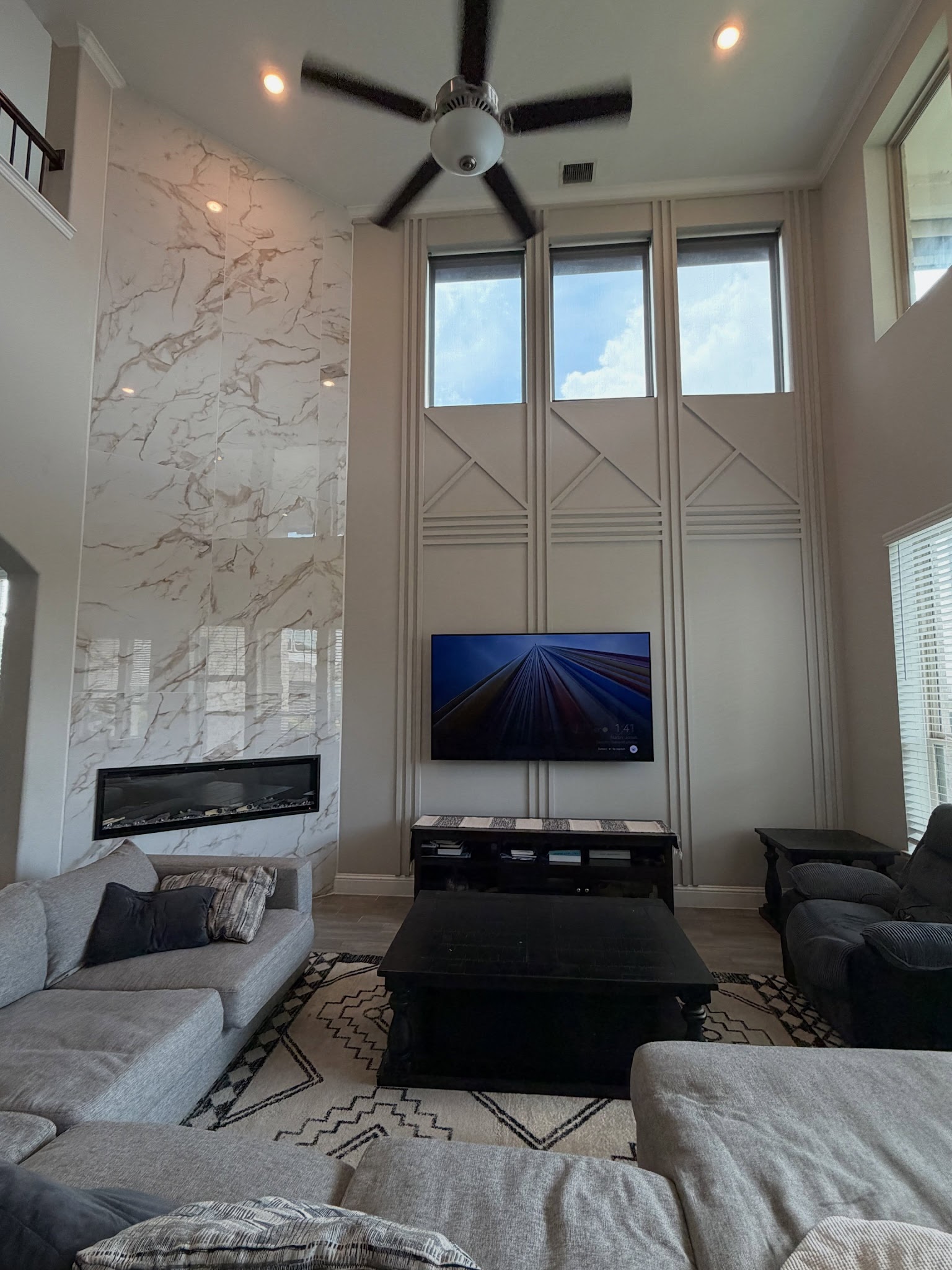 7. Tall Tonal Panels Beside a Fireplace