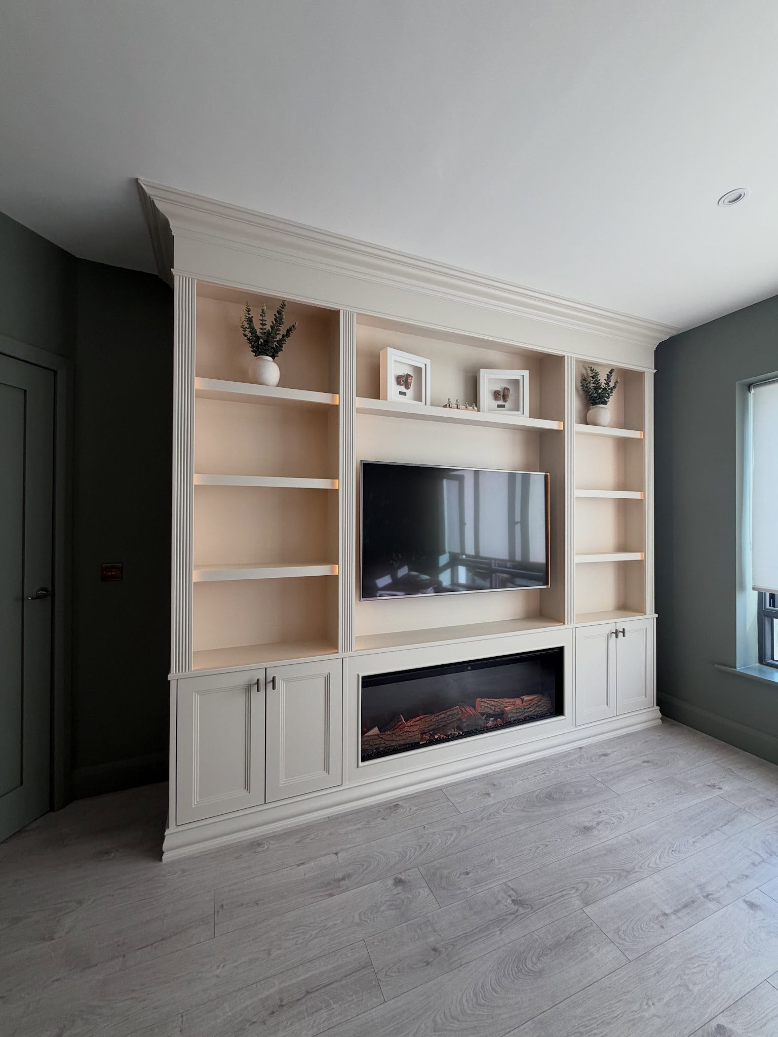 19. Contrast Cream Built-Ins With Muted Teal