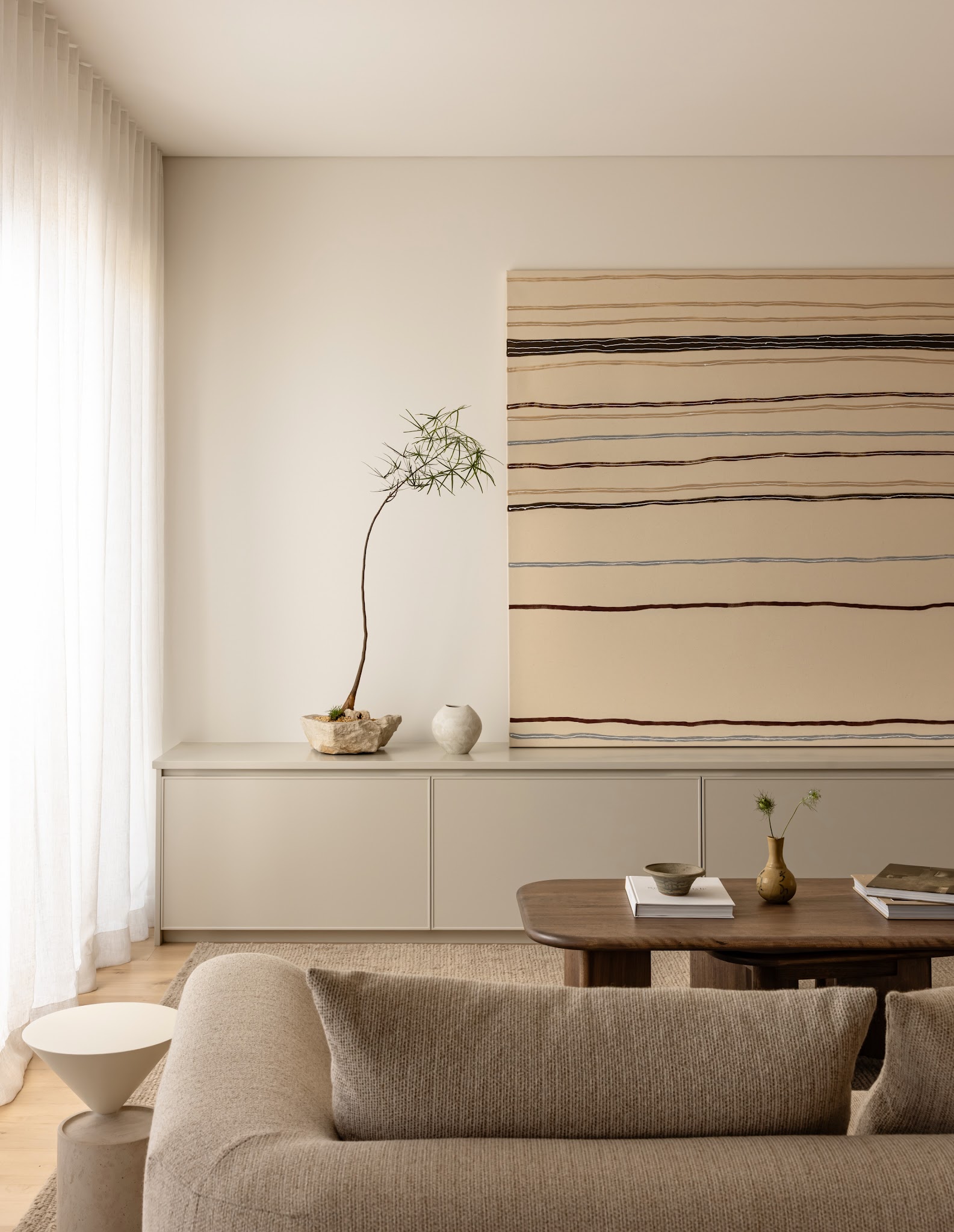 10. Make One Oversized Canvas the Wall Accent