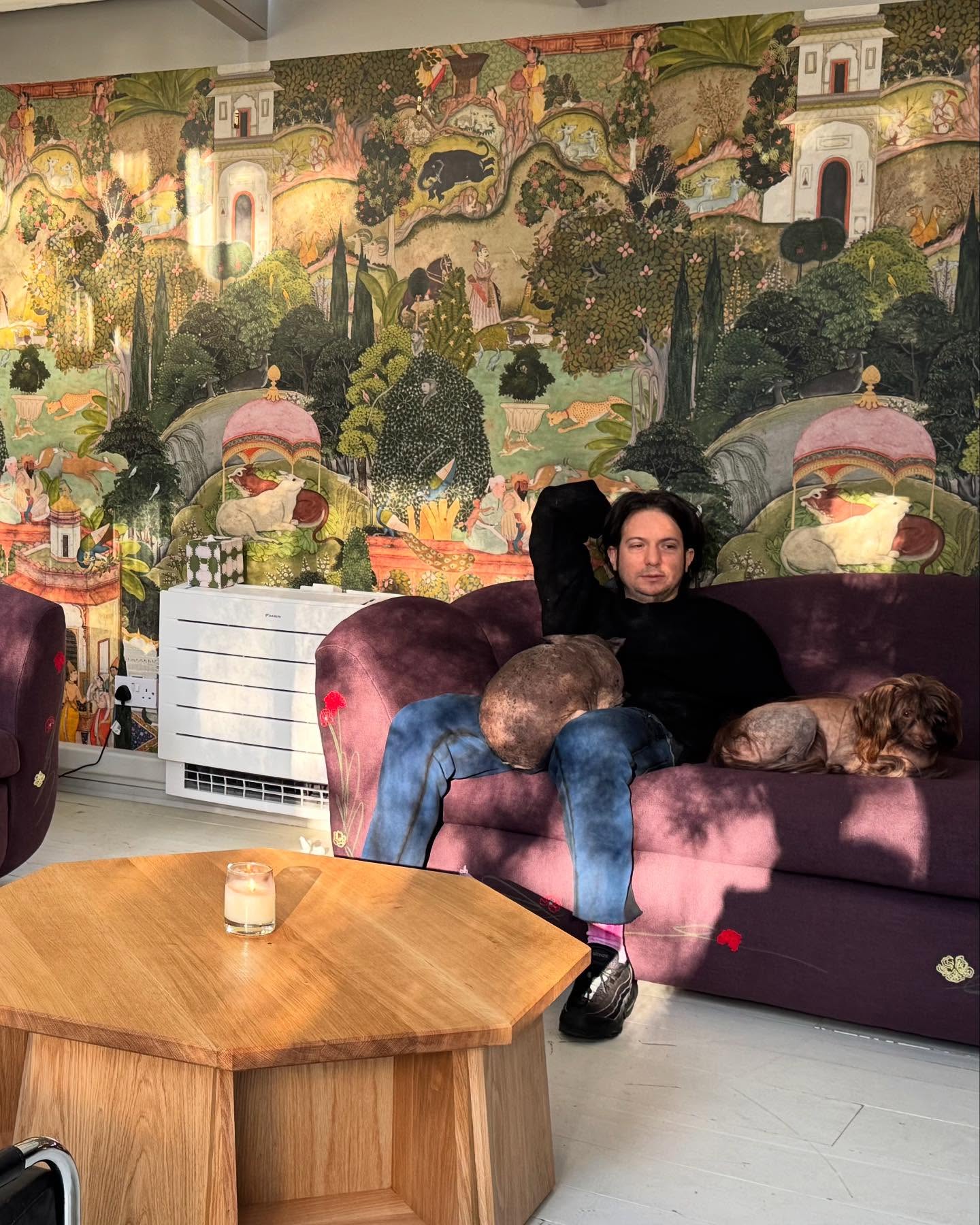 11. Keep the Mural Scene Visible Above the Sofa