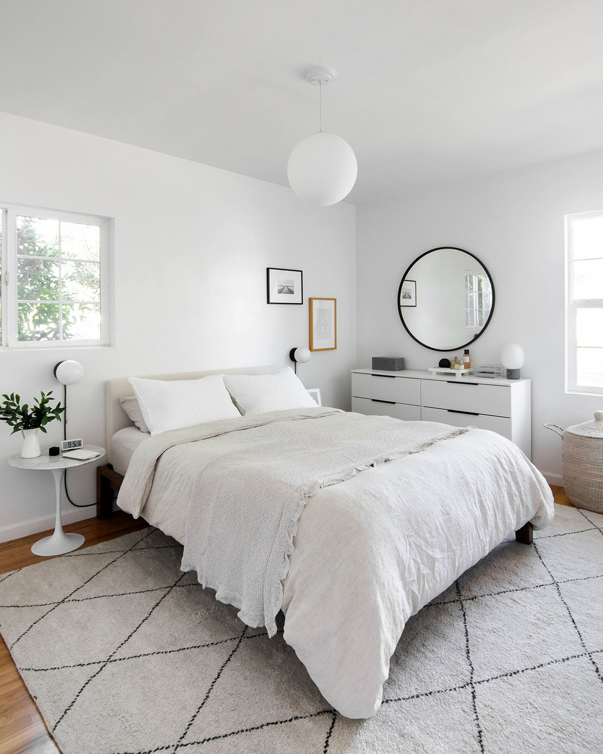 15. Give an All White Bedroom a Fine Graphic Foundation