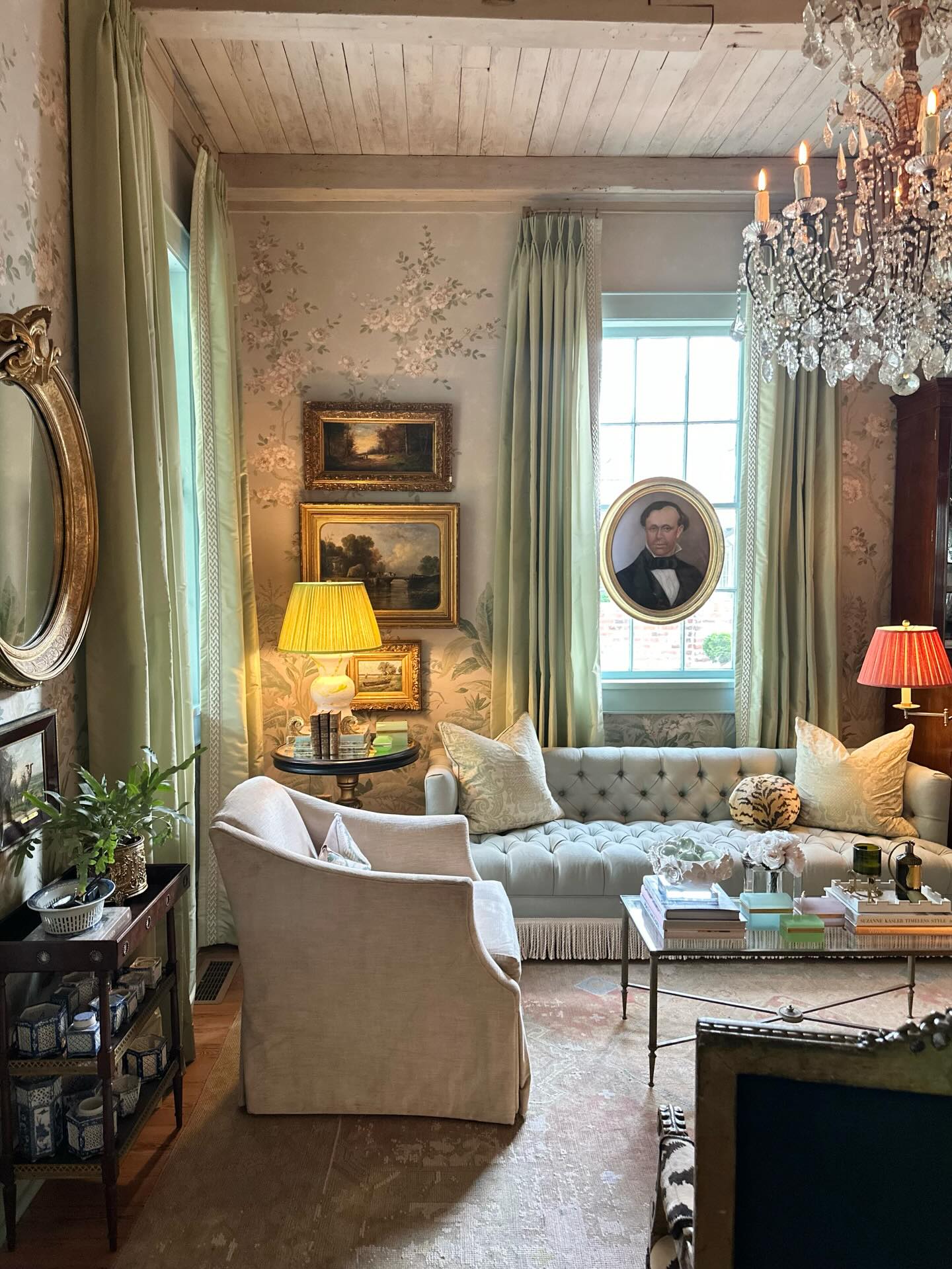3. Frame Collected Art With Soft Green Drapes