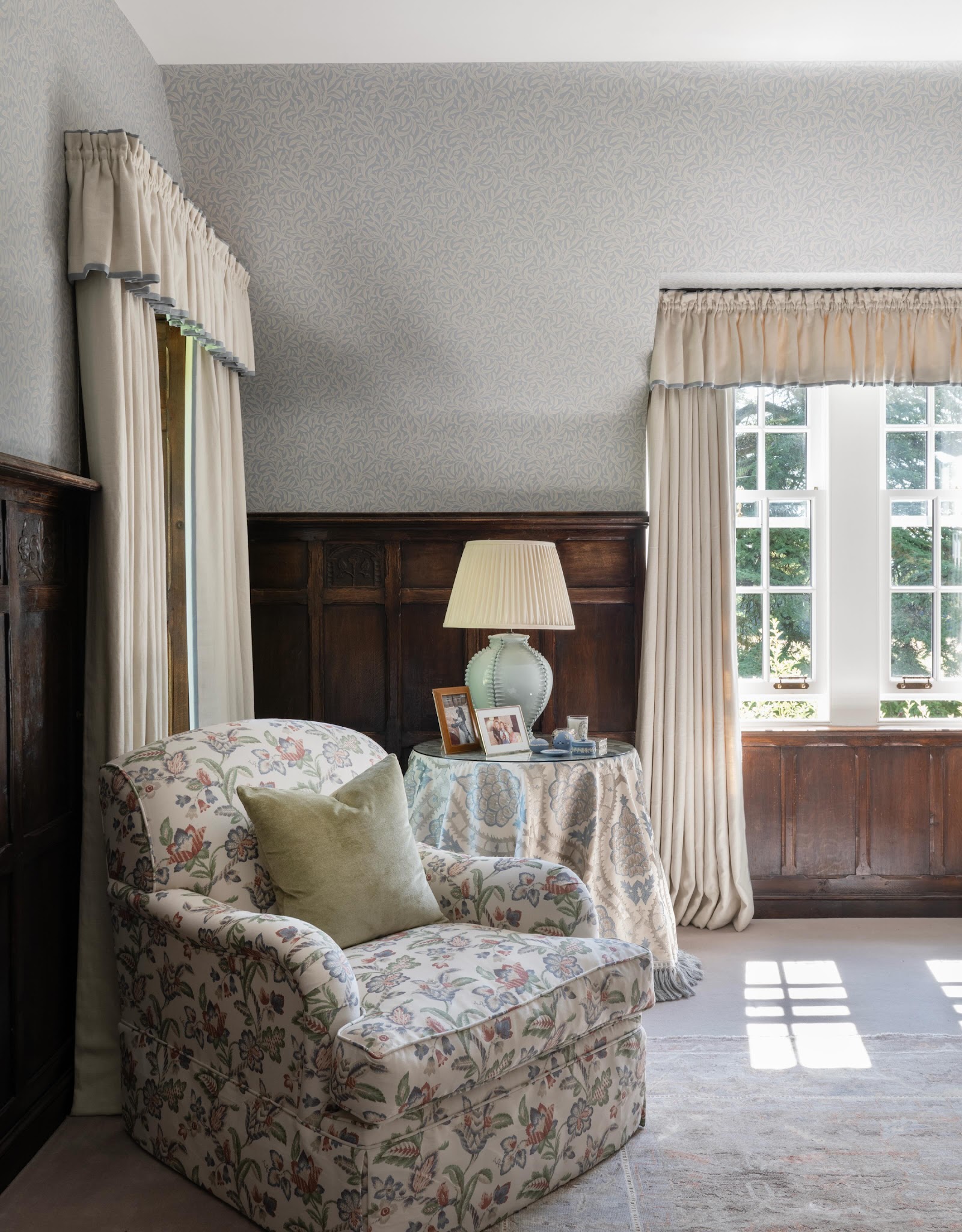 15. Lighten Dark Paneling With Pale Fabrics