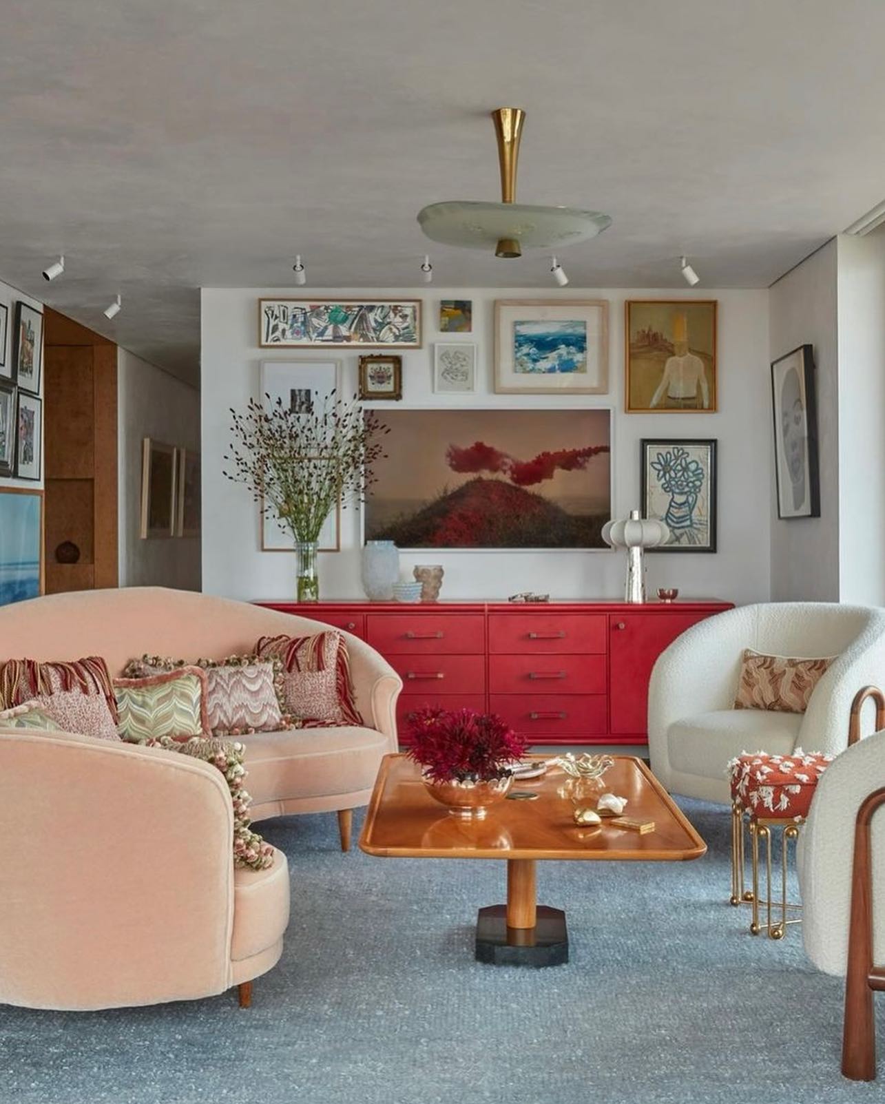 11. Pair Pastel Seating With a Red Cabinet