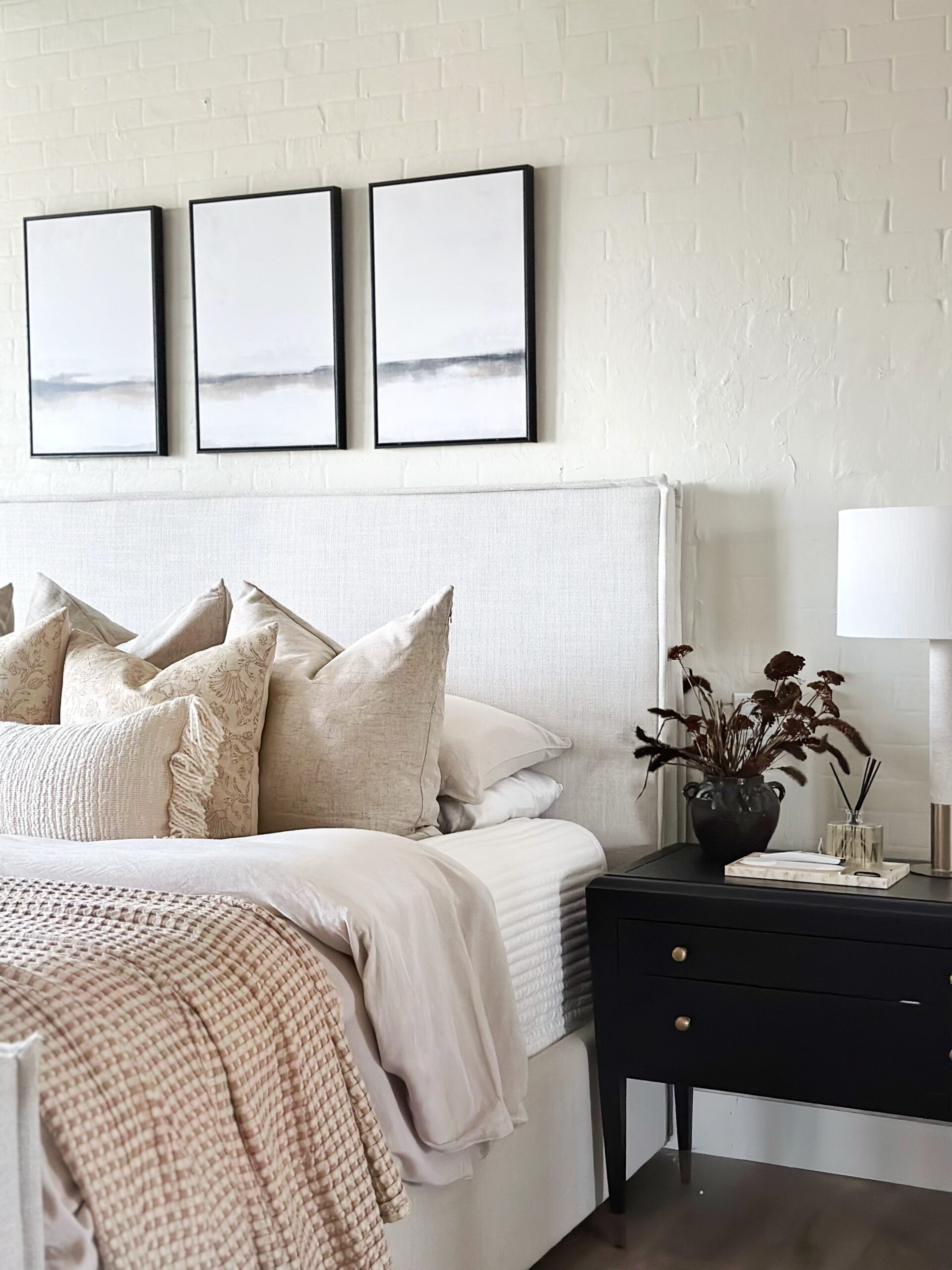 15. Create Warmth Through Oatmeal Textiles and Painted Brick