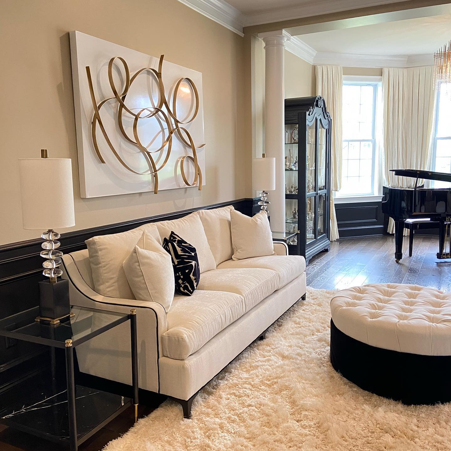 Outline a Cream Sofa With Black Piping