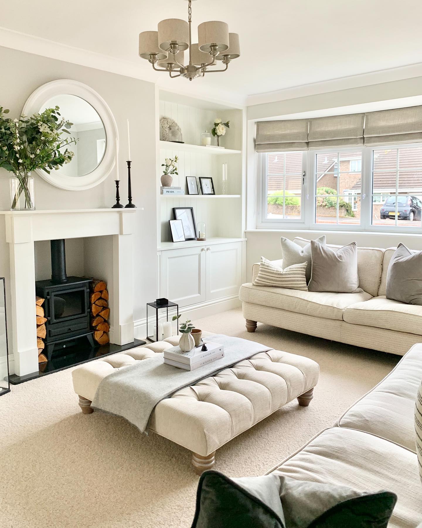 Let a Black Stove Anchor a Cream Room