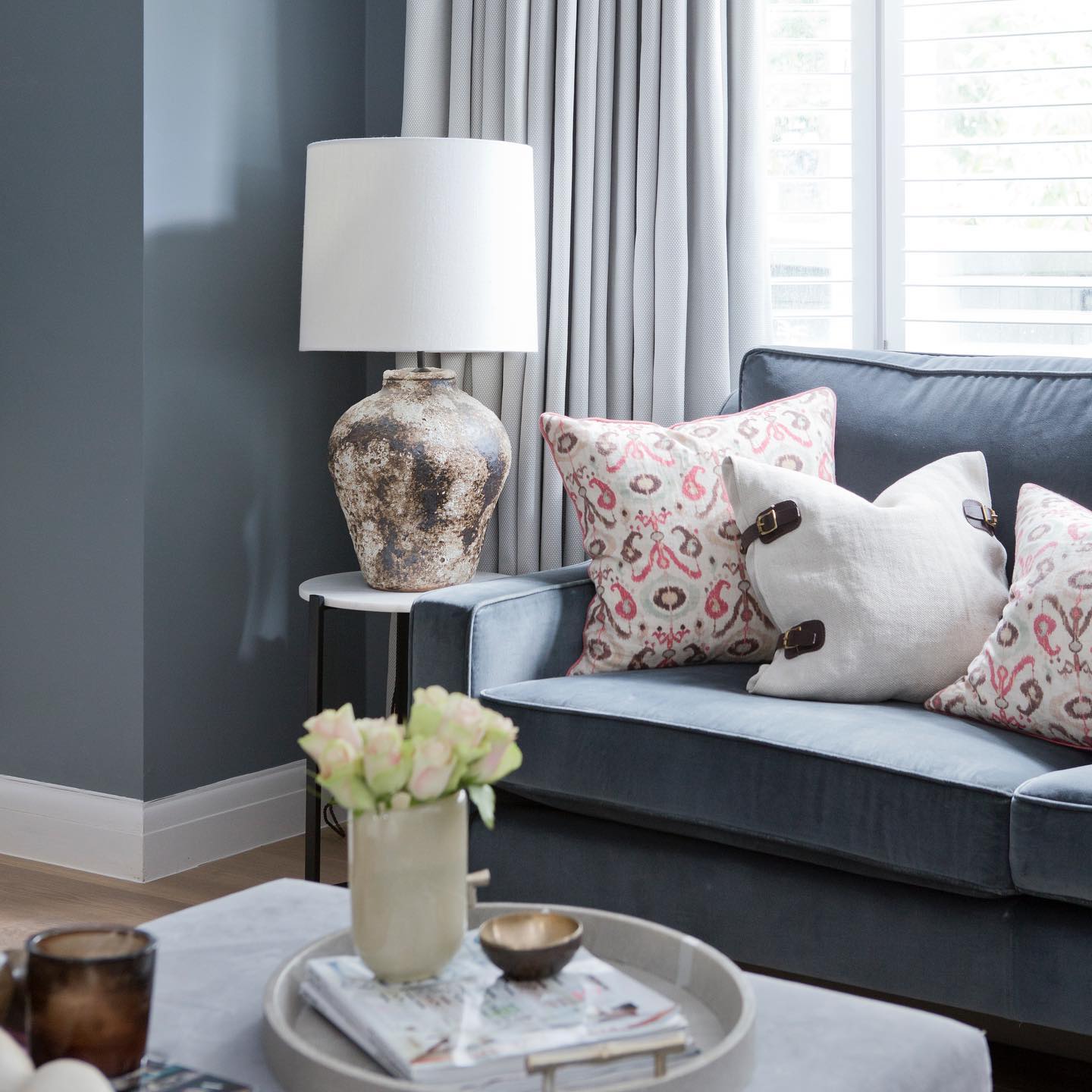 4. Soften Blue Walls with Pale Gray Curtains