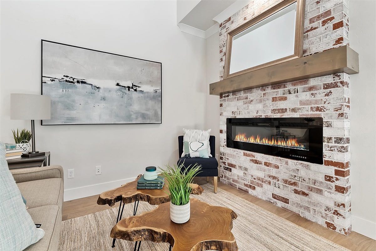 Pair Whitewashed Brick with a Sleek Linear Fireplace