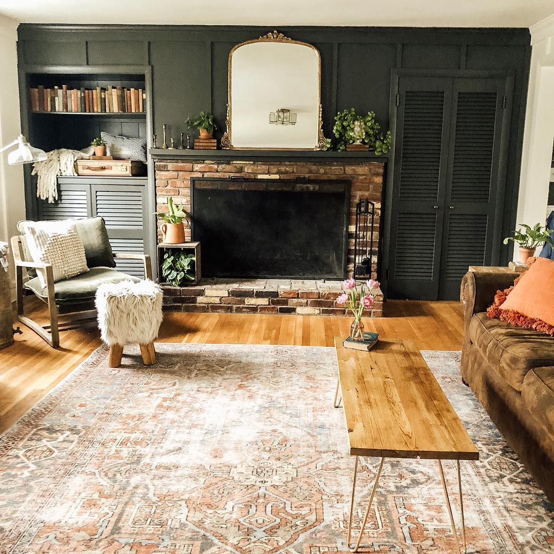 Unify an Asymmetrical Fireplace Wall with One Dark Color