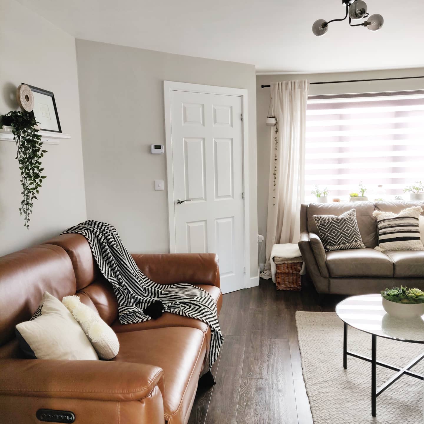 Unify Different Brown Sofas with Shared Textiles