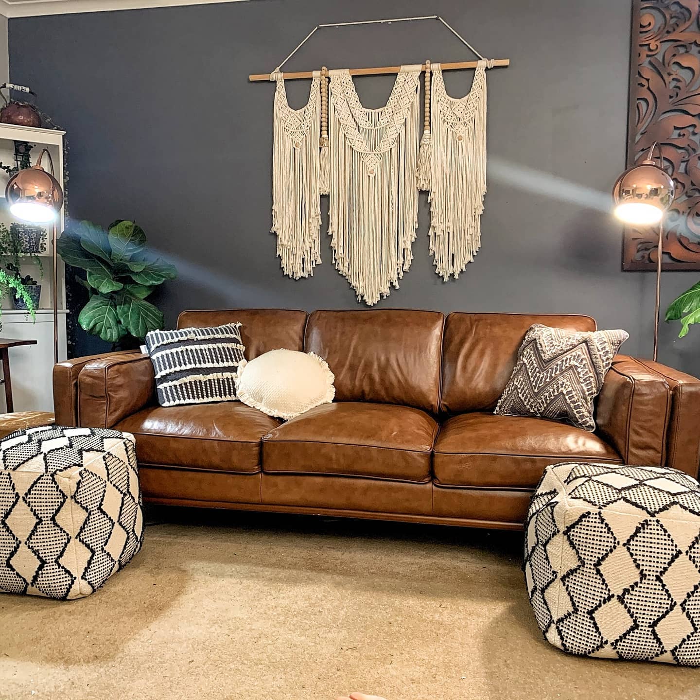 5. Soften Leather With Macrame and Patterned Poufs