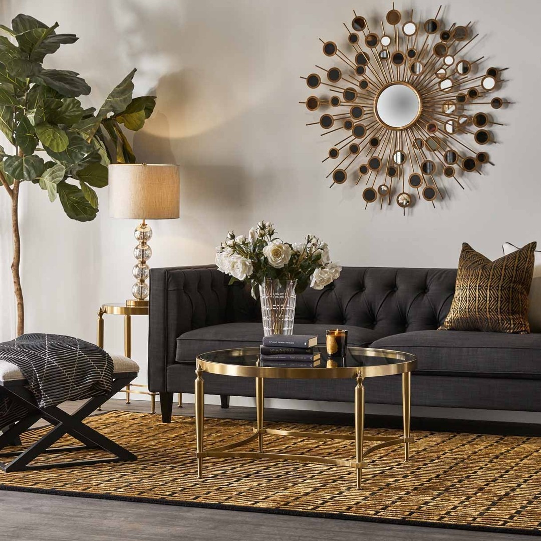 Warm a Charcoal Sofa with Gold-Tone Accents