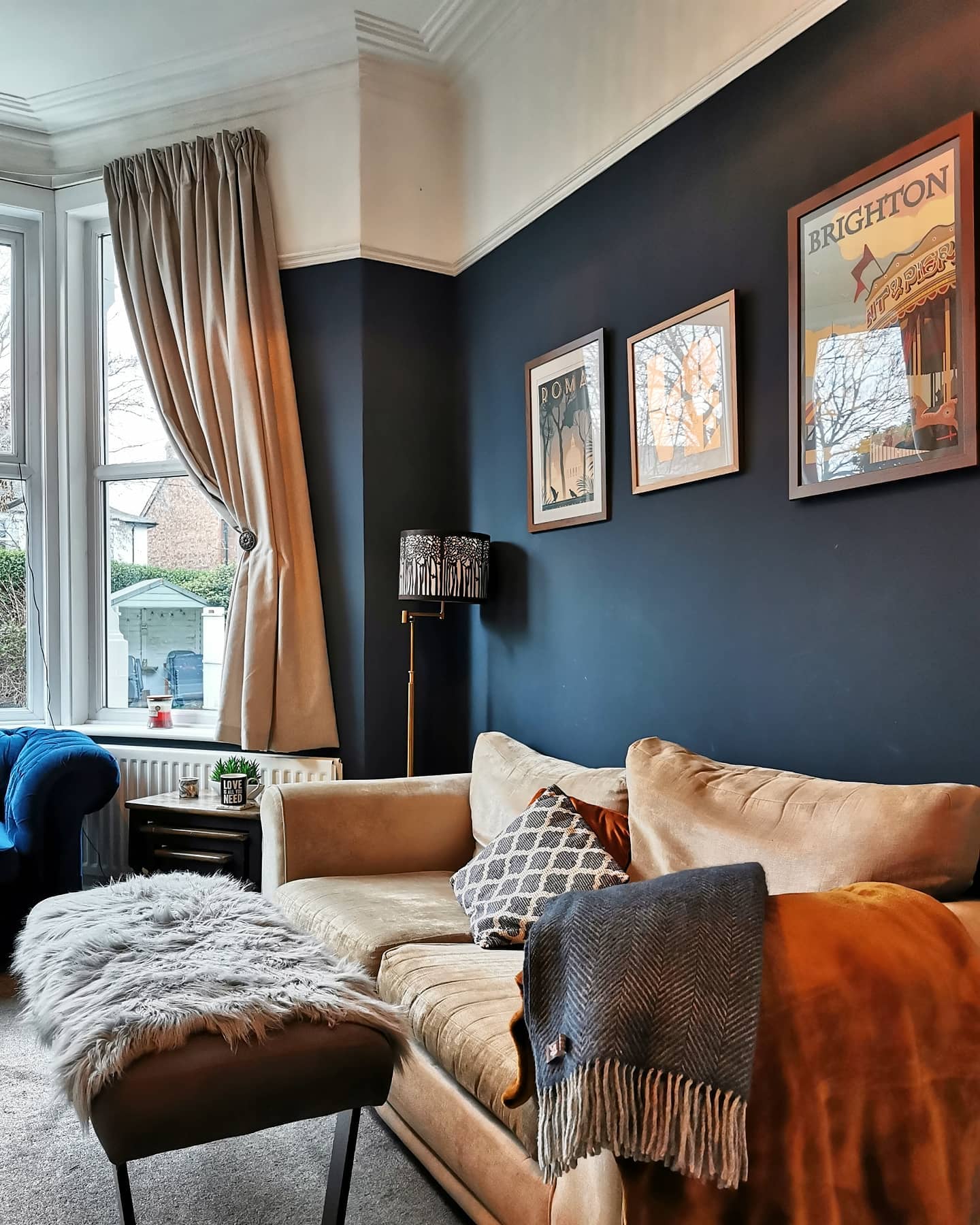 Layer Warm Neutrals Against Navy Walls