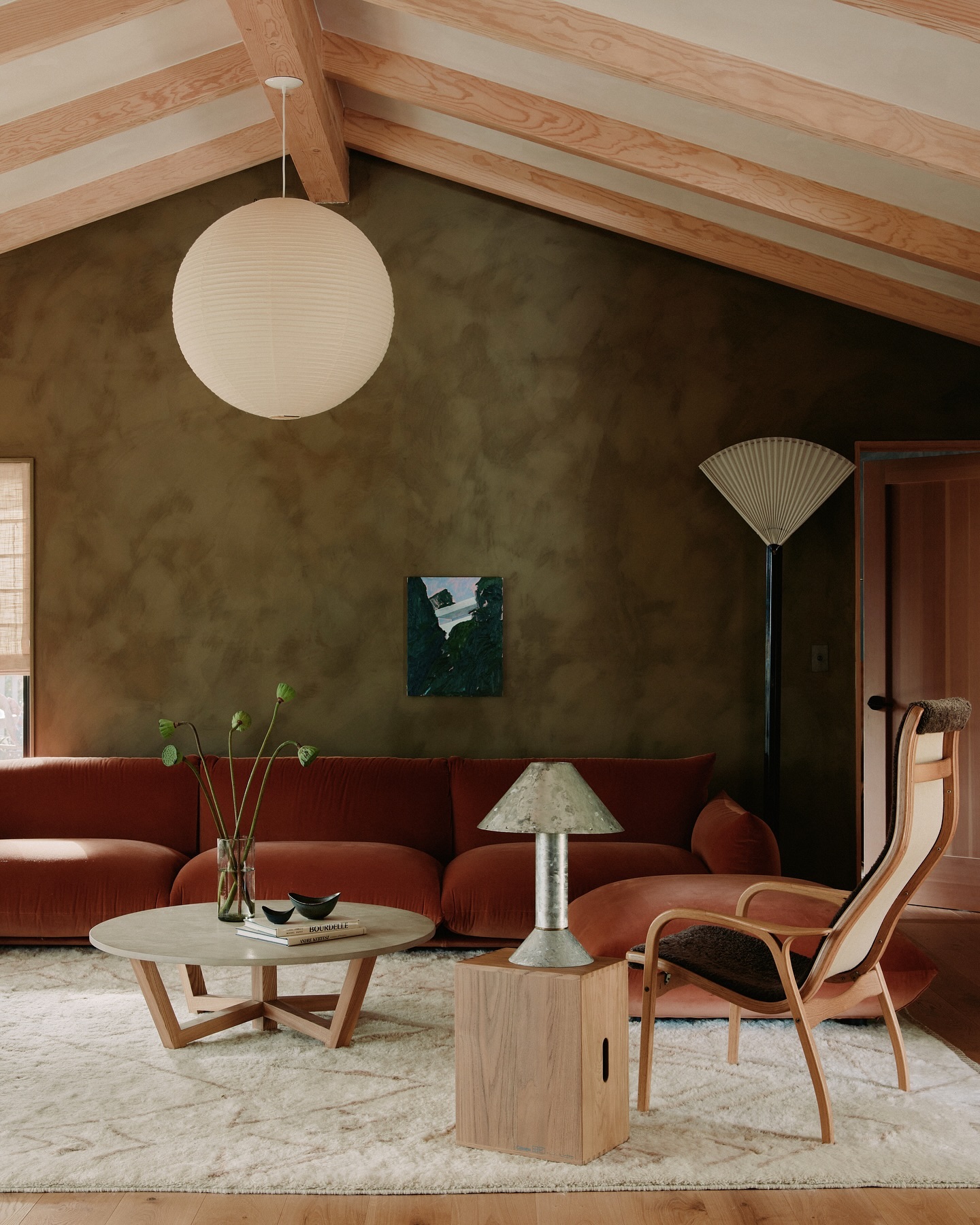 Pair an Olive Wall with a Rust Sofa