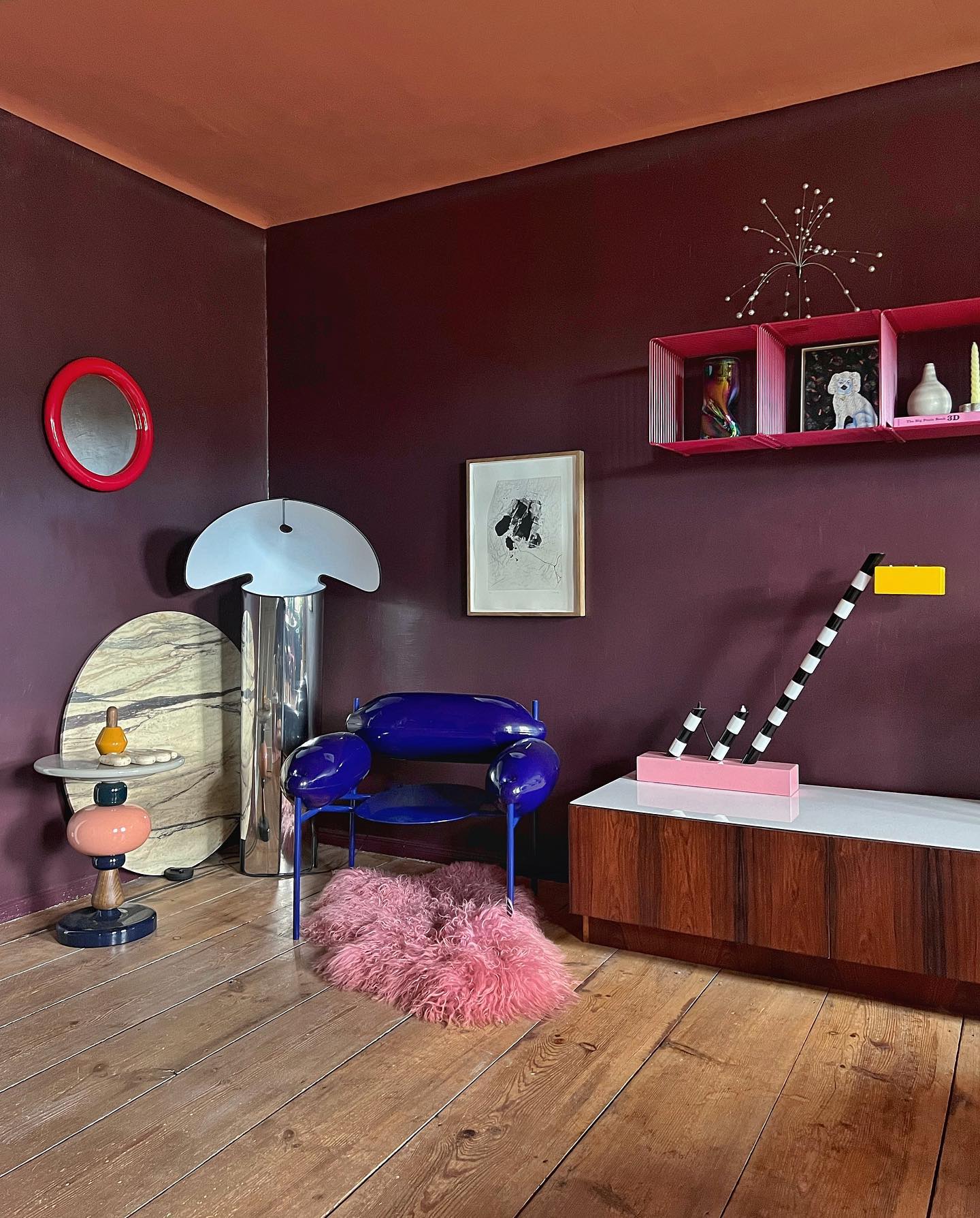Add a Few Reflective Pieces to Plum Walls