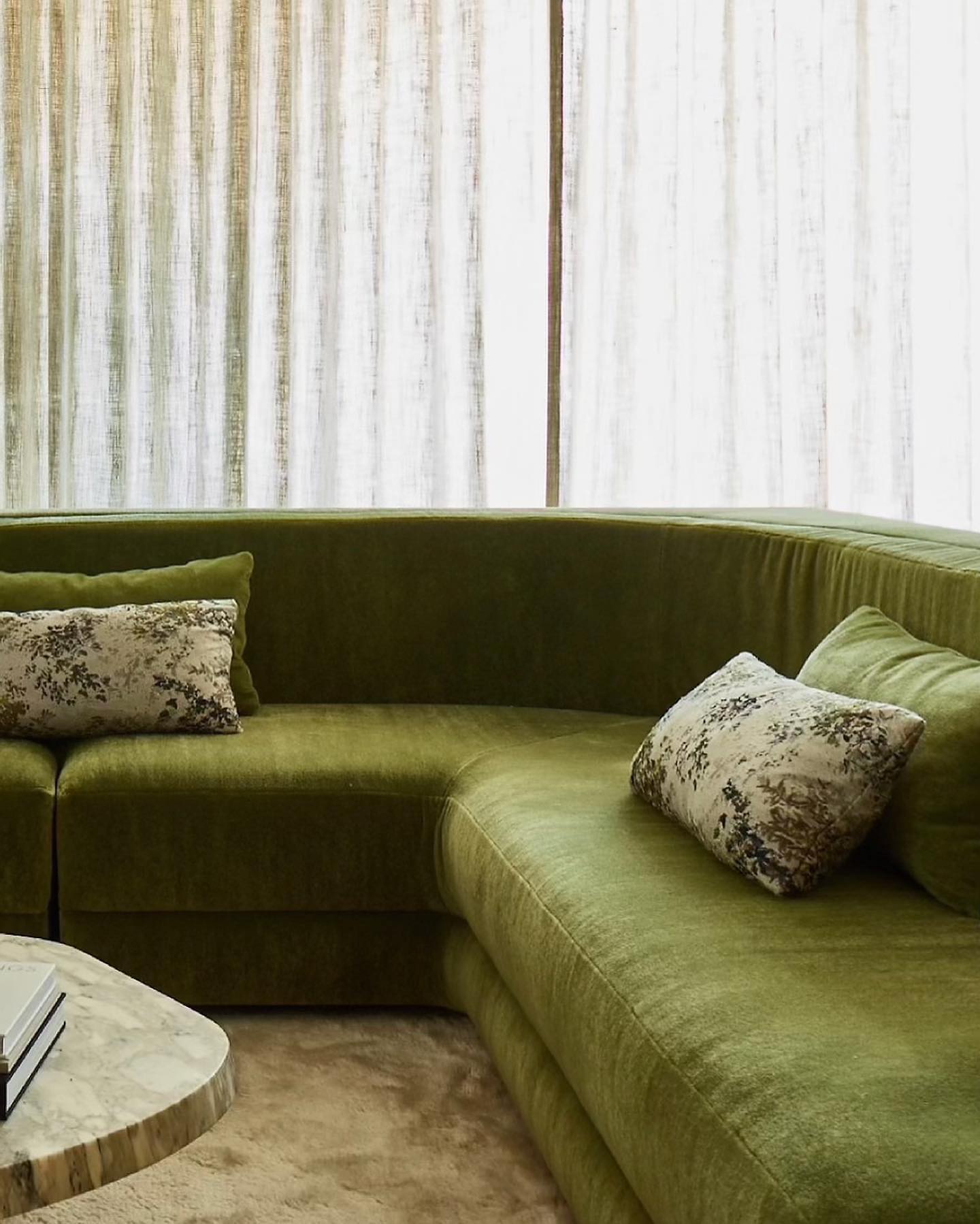 10. Soften Olive Seating With Sheer Curtains
