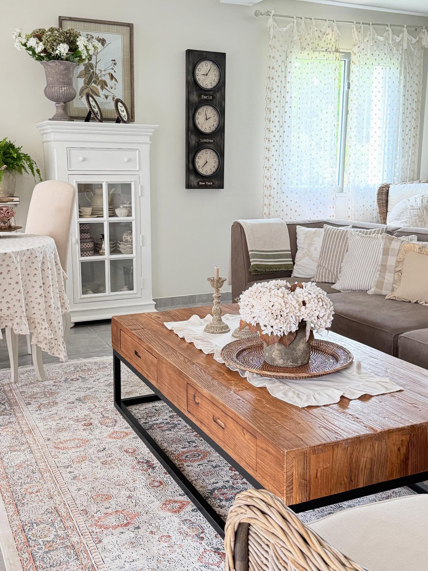 Balance a Substantial Table With Airy Floral Curtains