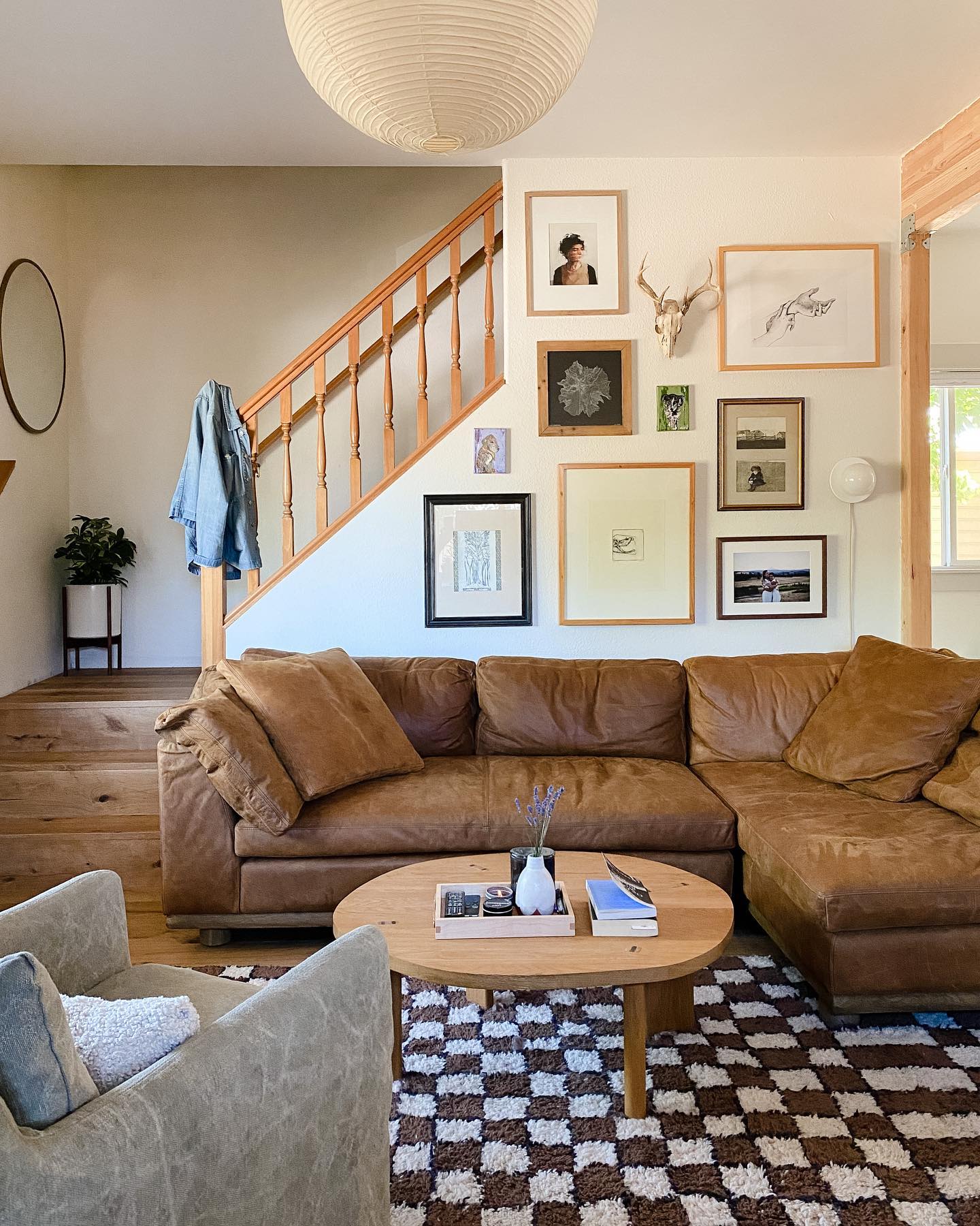 Shape Your Gallery Around An Awkward Stair Wall