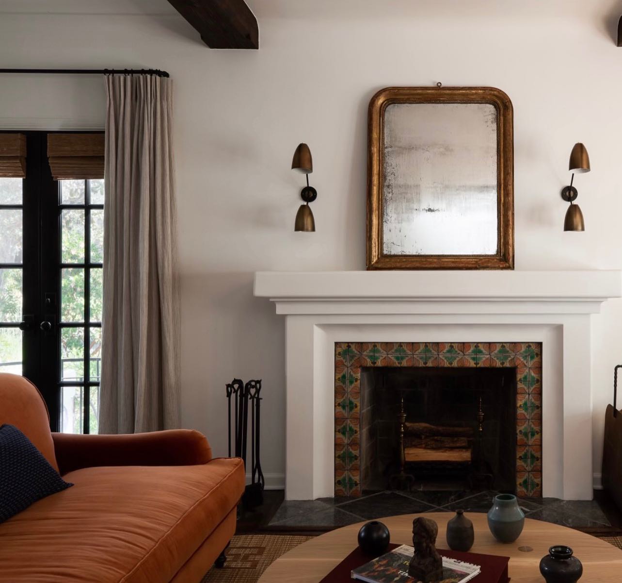11. Pull Upholstery Colors from Antique Fireplace Tile