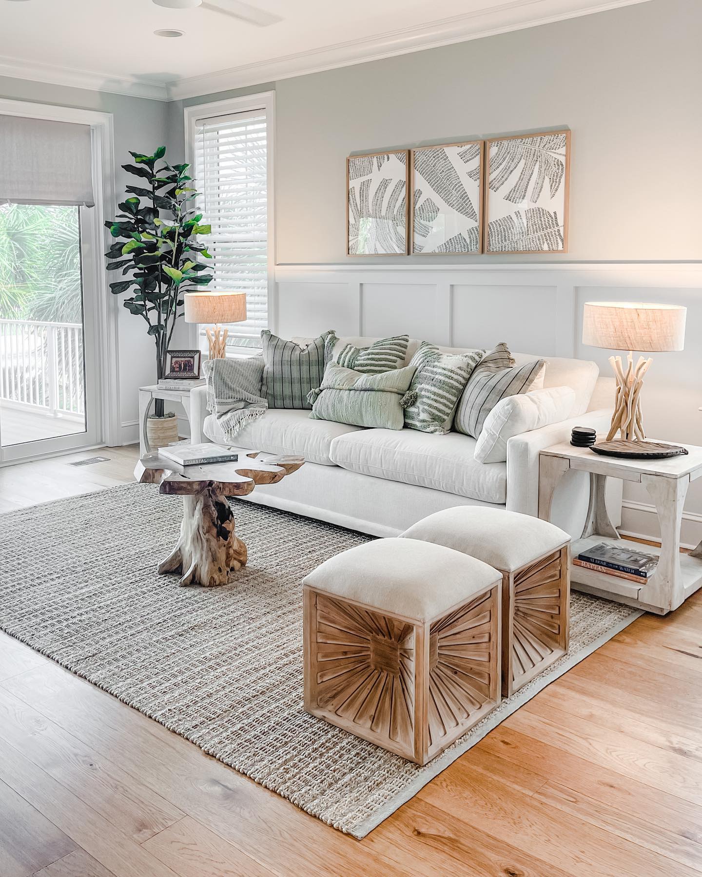 6. Pair a pale blue paneled wall with compact ottomans