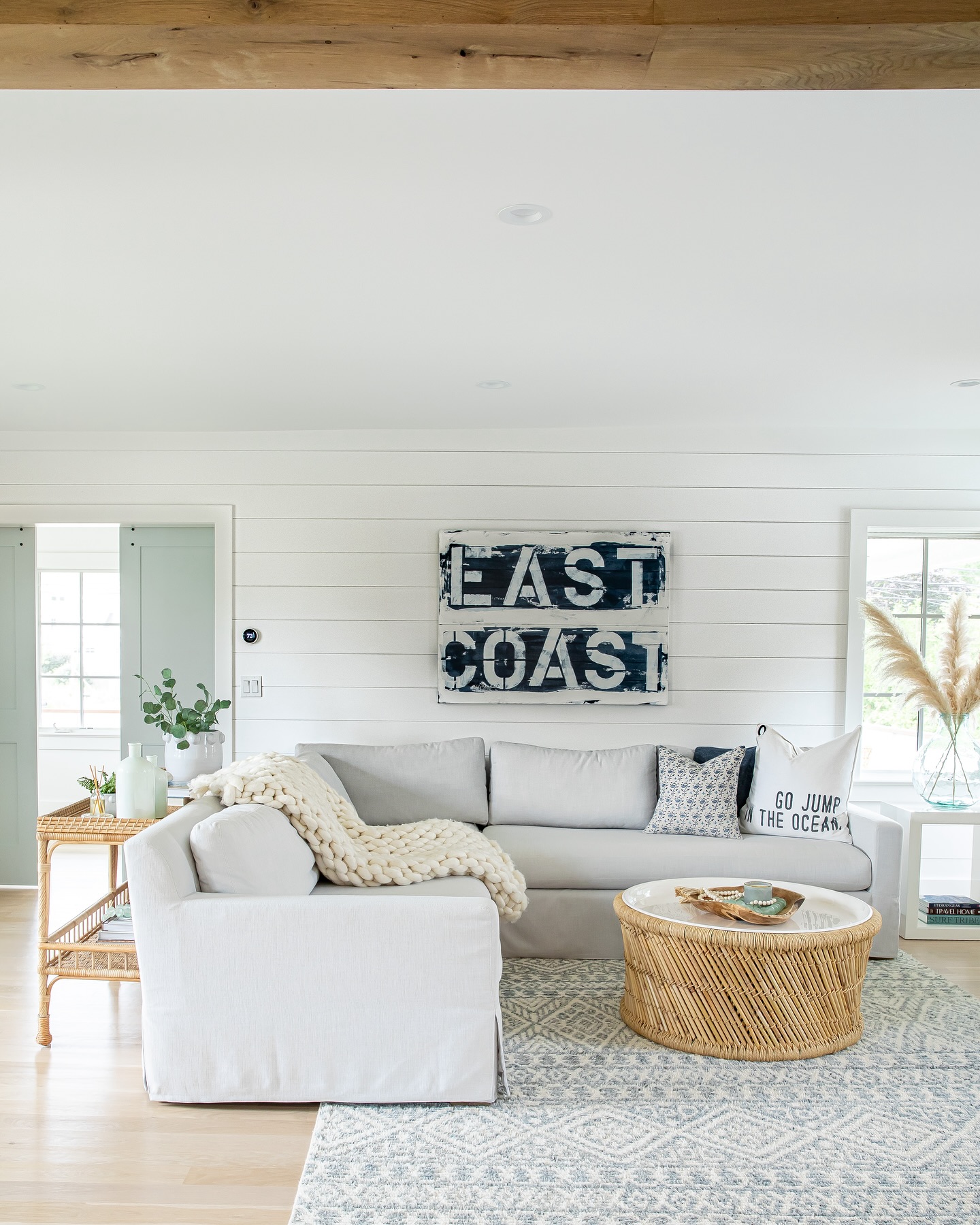 8. Center graphic artwork over a slipcovered sectional