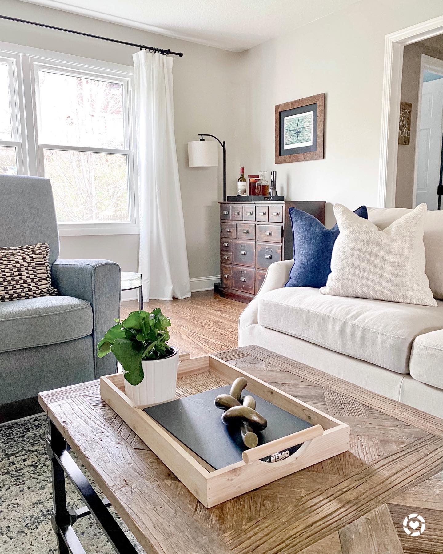 Balance a Weathered Coffee Table with Blue Accents