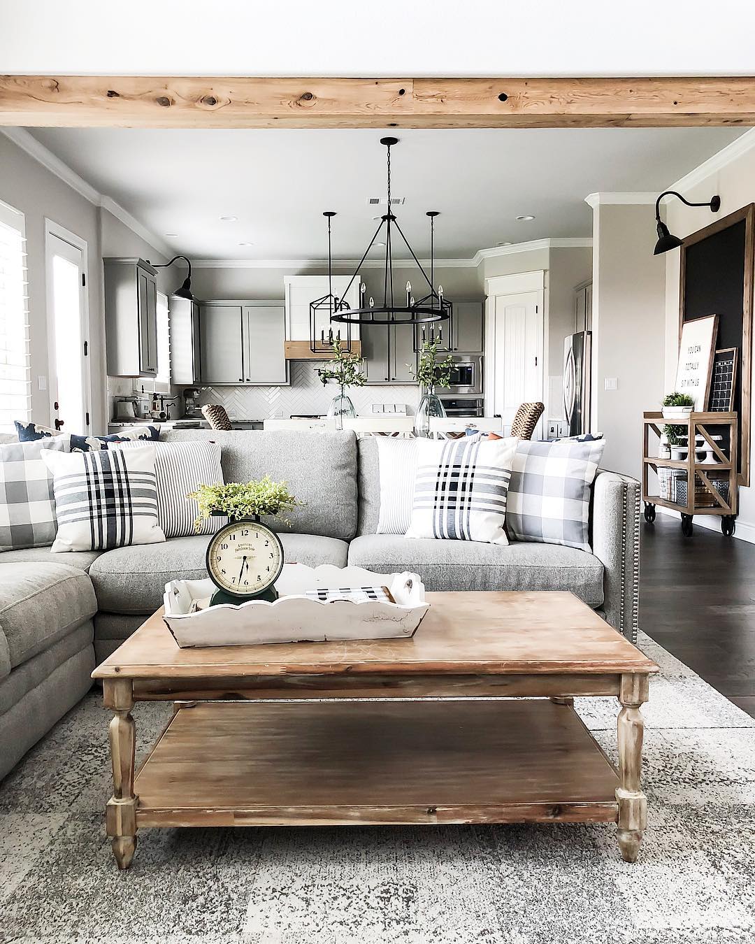 Mix Checks and Stripes Across a Gray Sofa