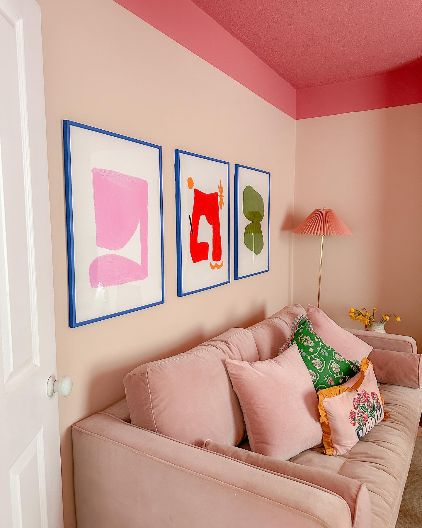 4. Outline a Blush Wall With Blue Picture Frames