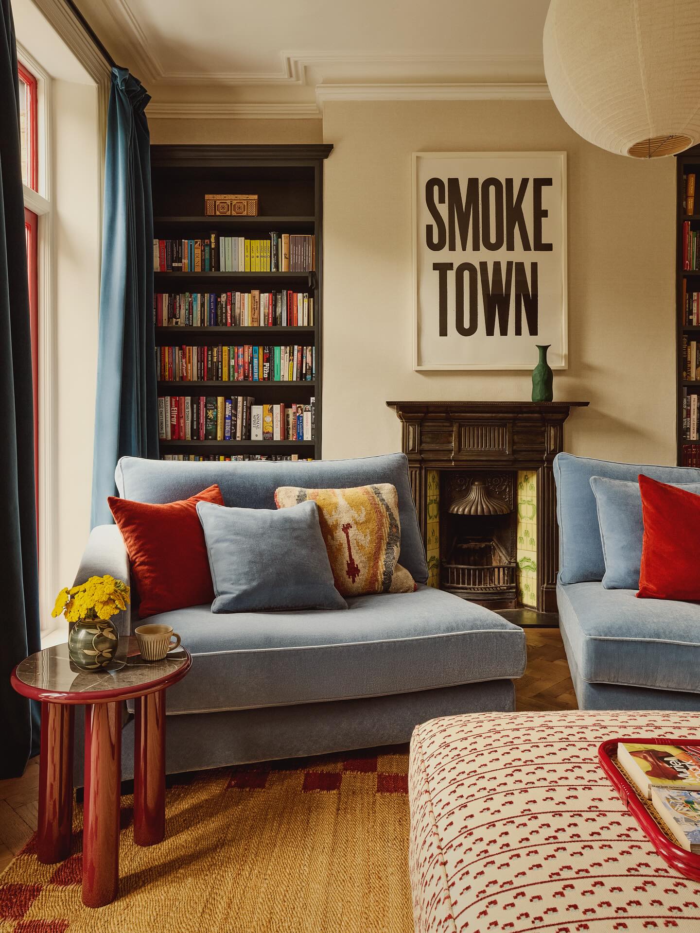 6. Set Powder Blue Seating Against Cream Walls