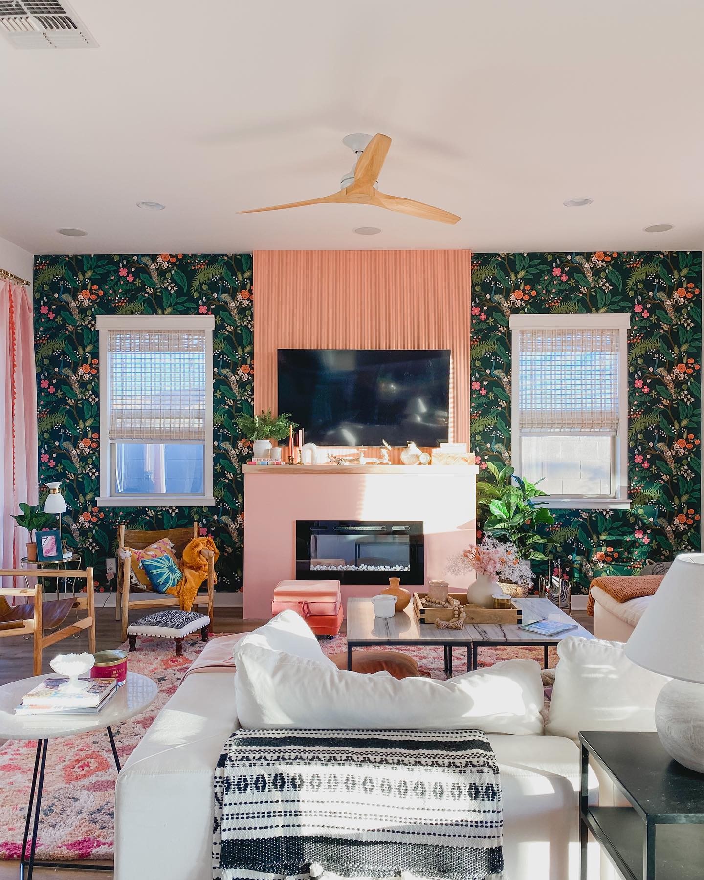 13. Frame an Apricot Fireplace Wall With Dark Wallpaper