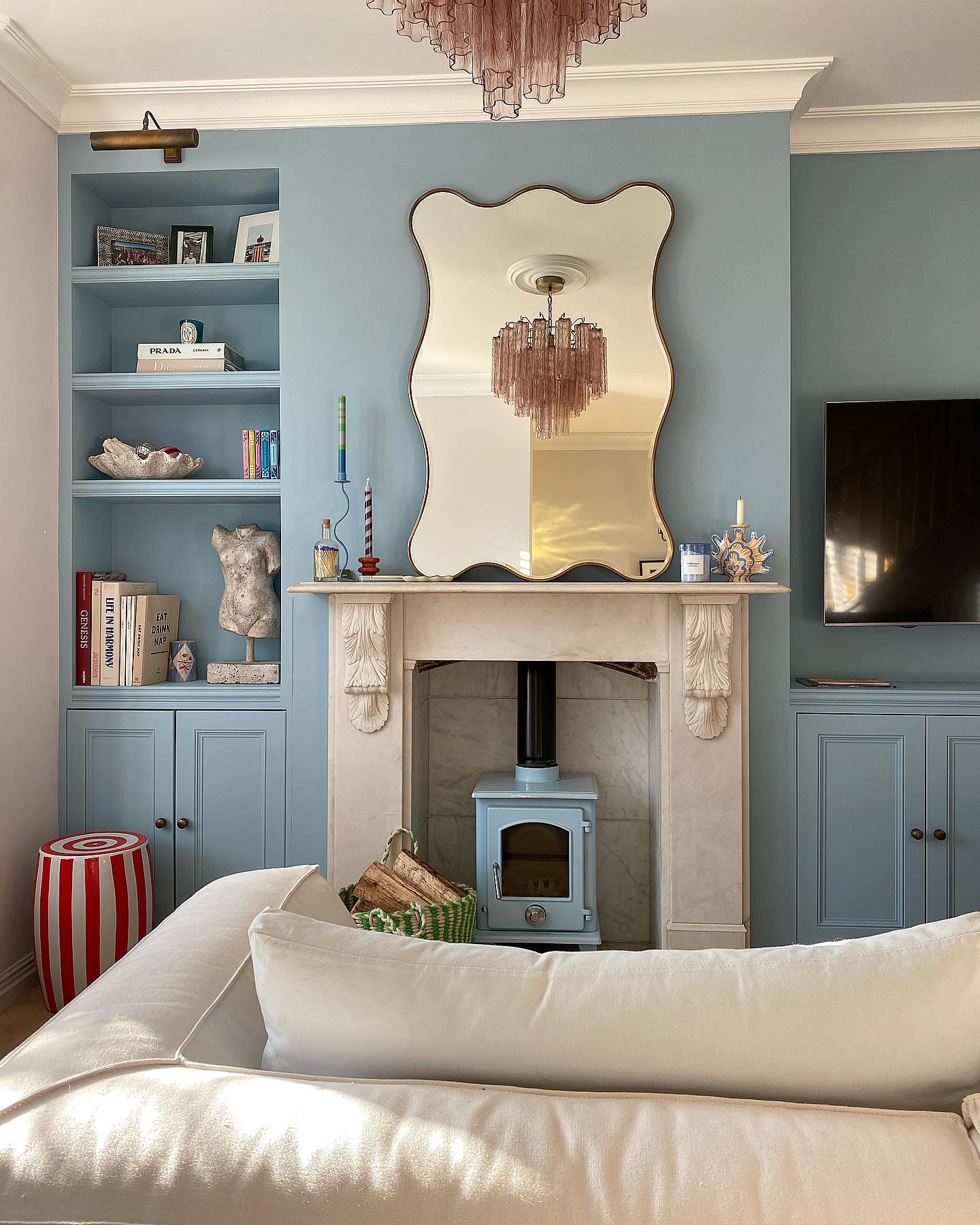14. Unify Alcove Storage With Soft Blue Paint