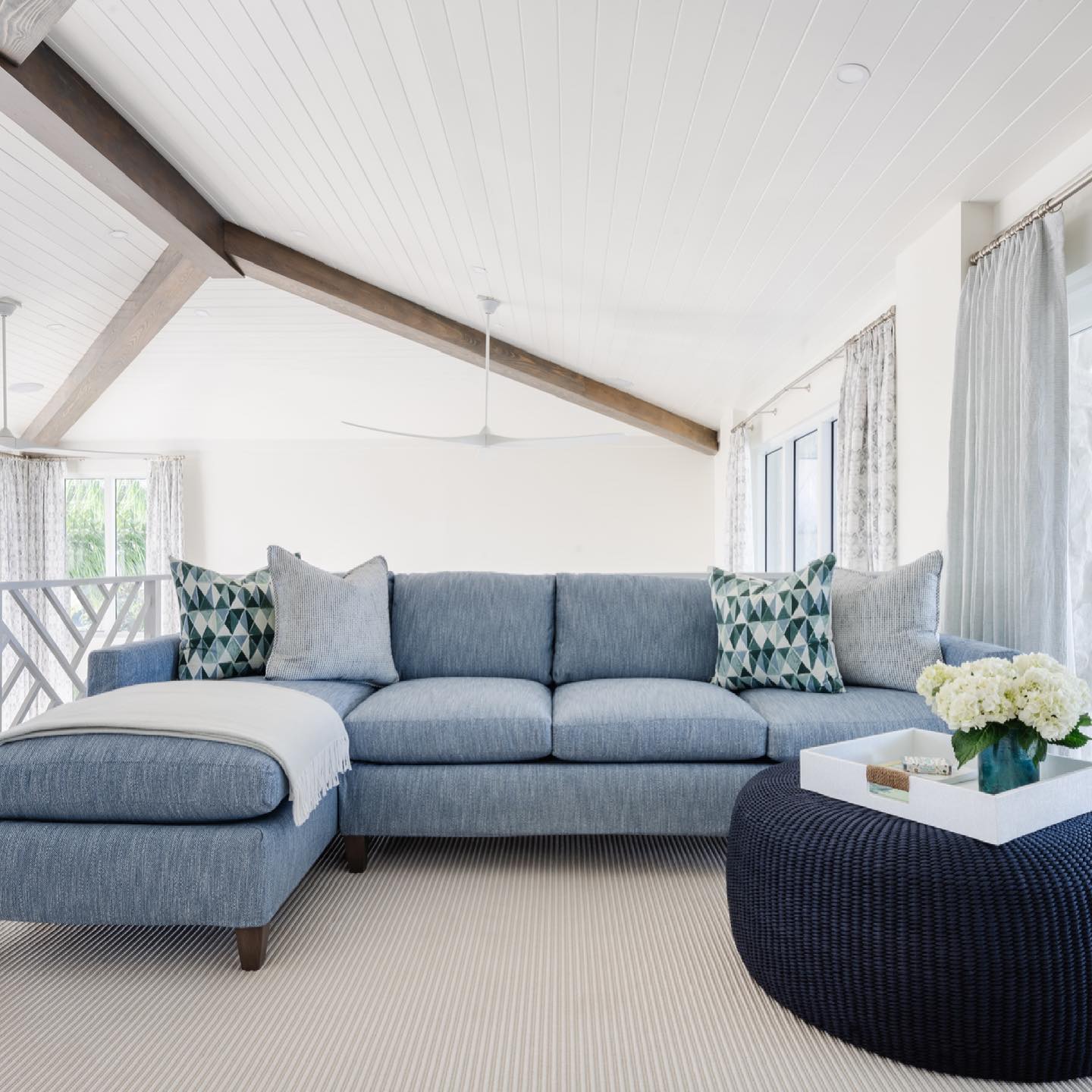 15. Make a Pale Blue Sectional the Main Lounge Seat