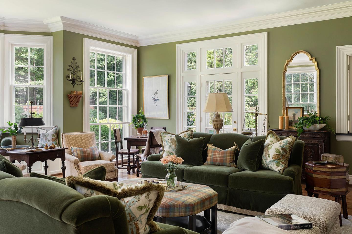 15. Tie Green Seating Together with a Plaid Ottoman
