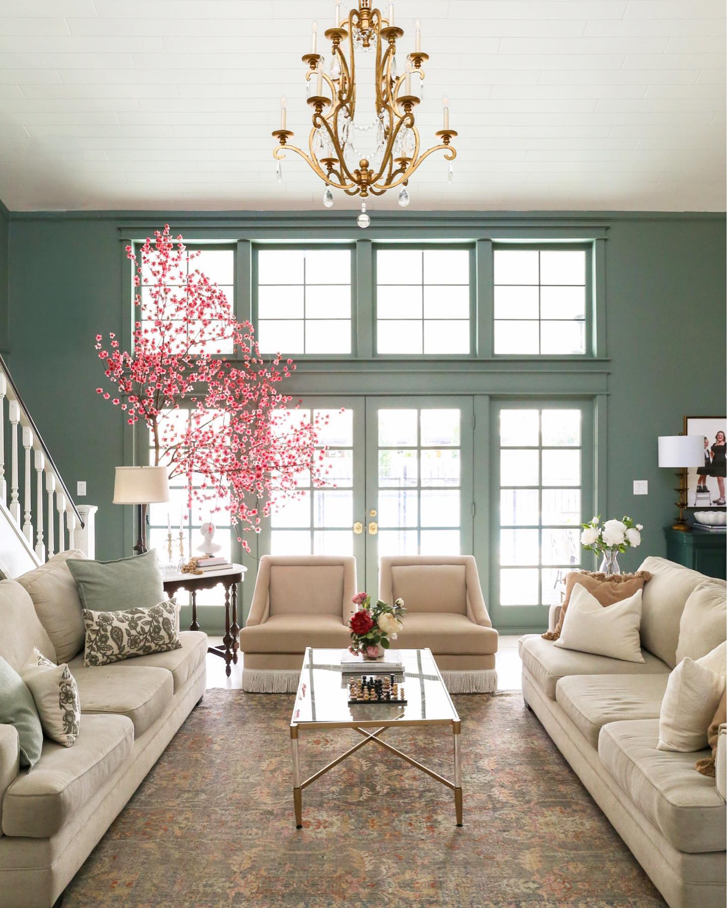 16. Face Pale Sofas Across a Glass Table