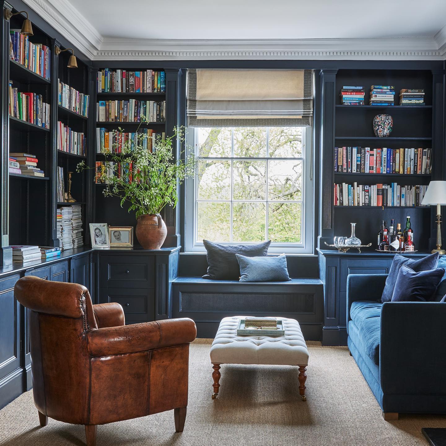 Tuck a Seat Between Bookshelves