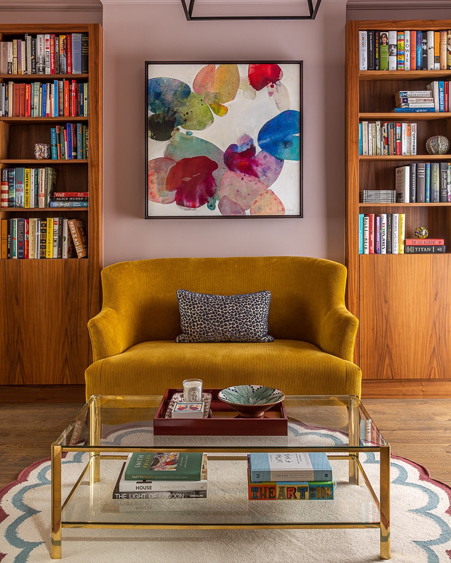4. Turn a Mustard Loveseat Into a Library Focal Point