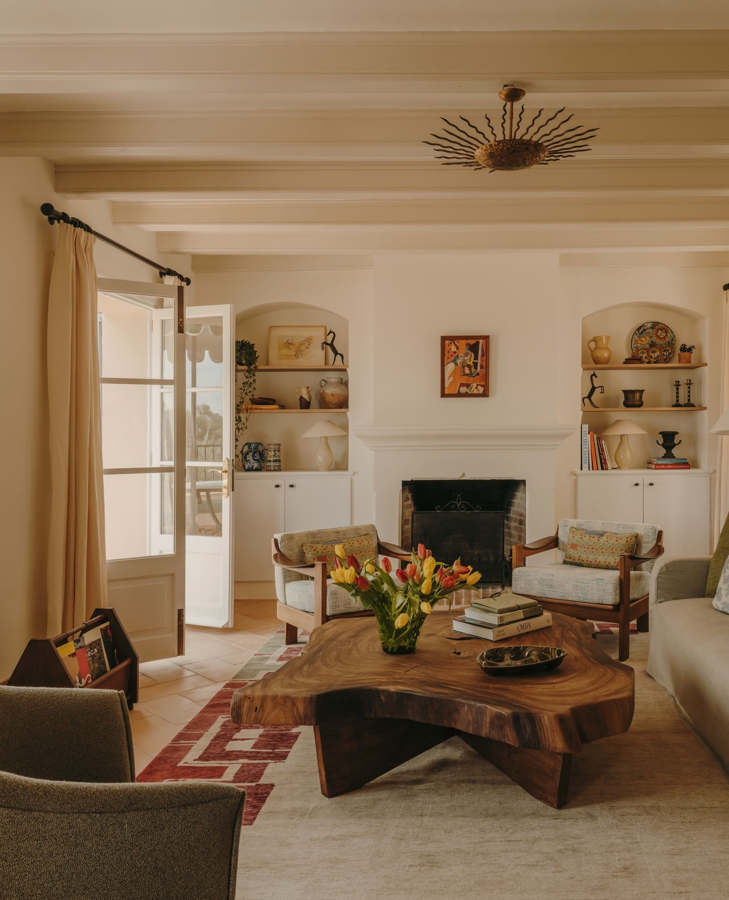 12. Spread Black Silhouettes Around a Brown Statement Table