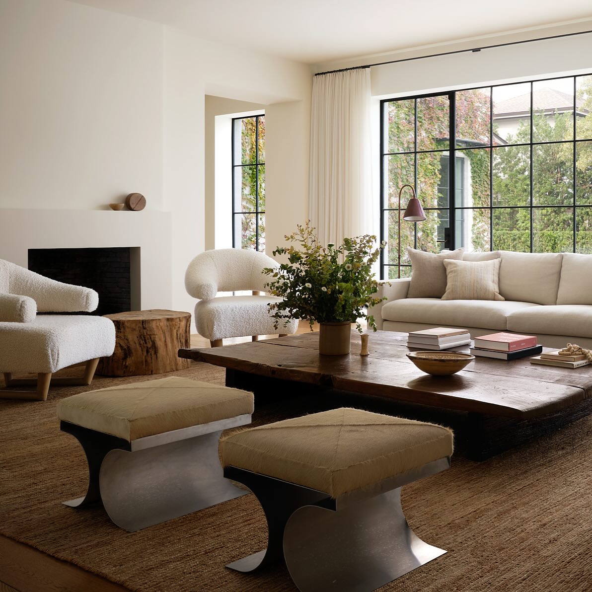 16. Pair Black Window Grids With a Broad Brown Table