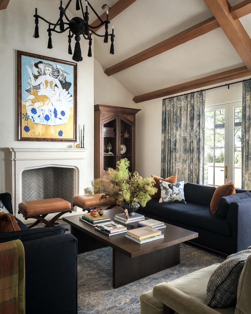 18. Echo Brown Ceiling Beams With a Black Chandelier