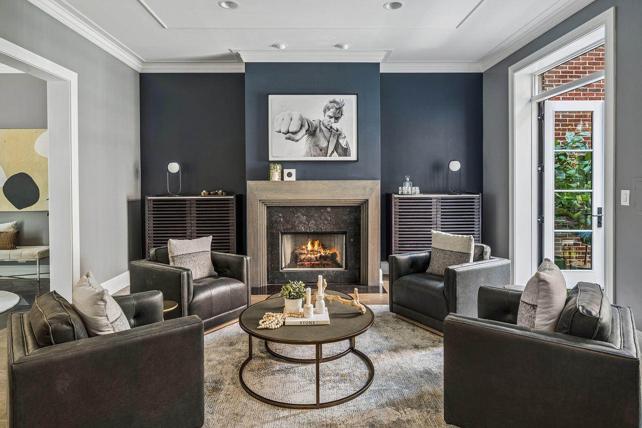 12. Arrange Black Armchairs Around Gold Accents