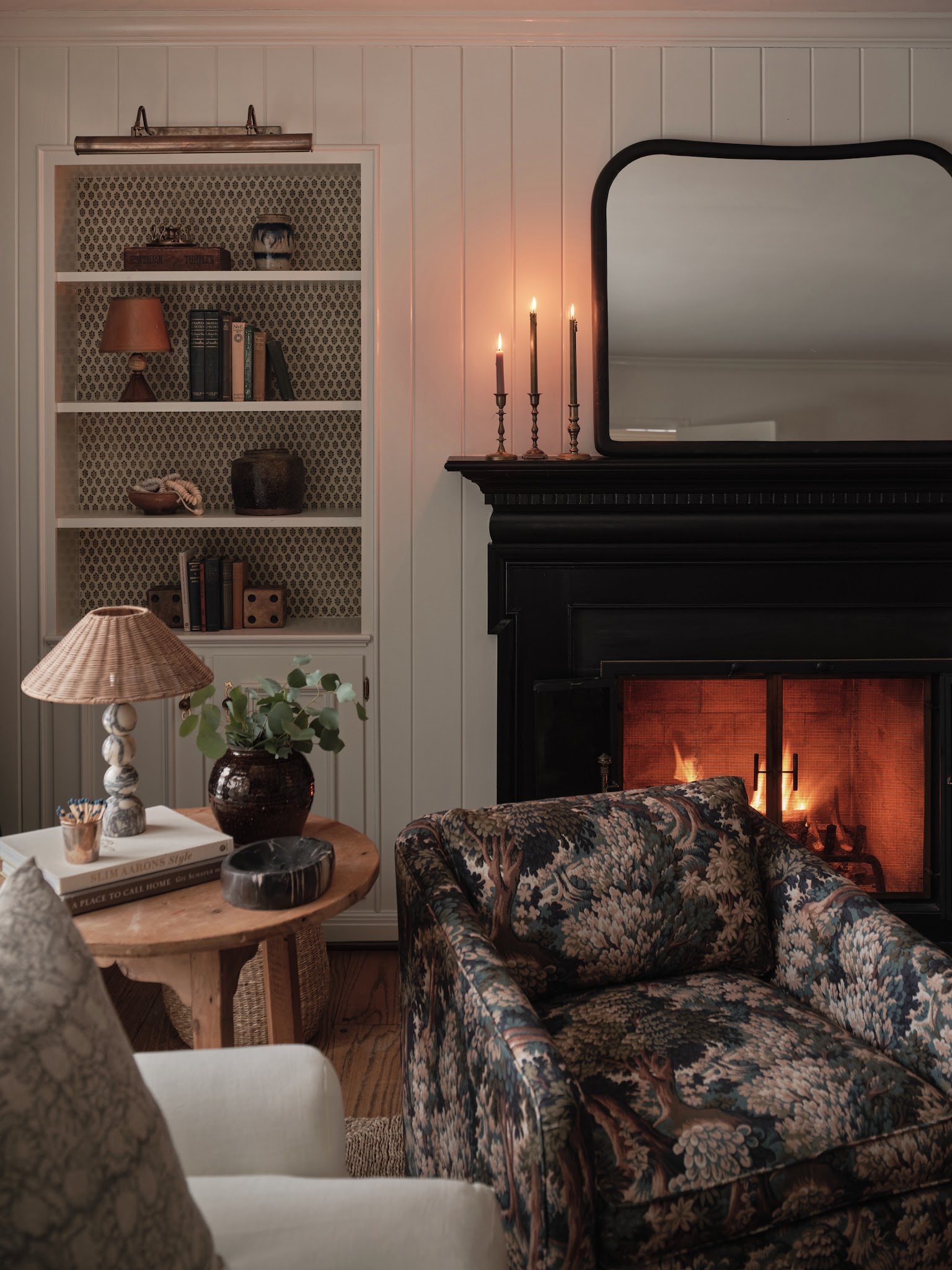 20. Warm a Black Mantel with Aged Brass