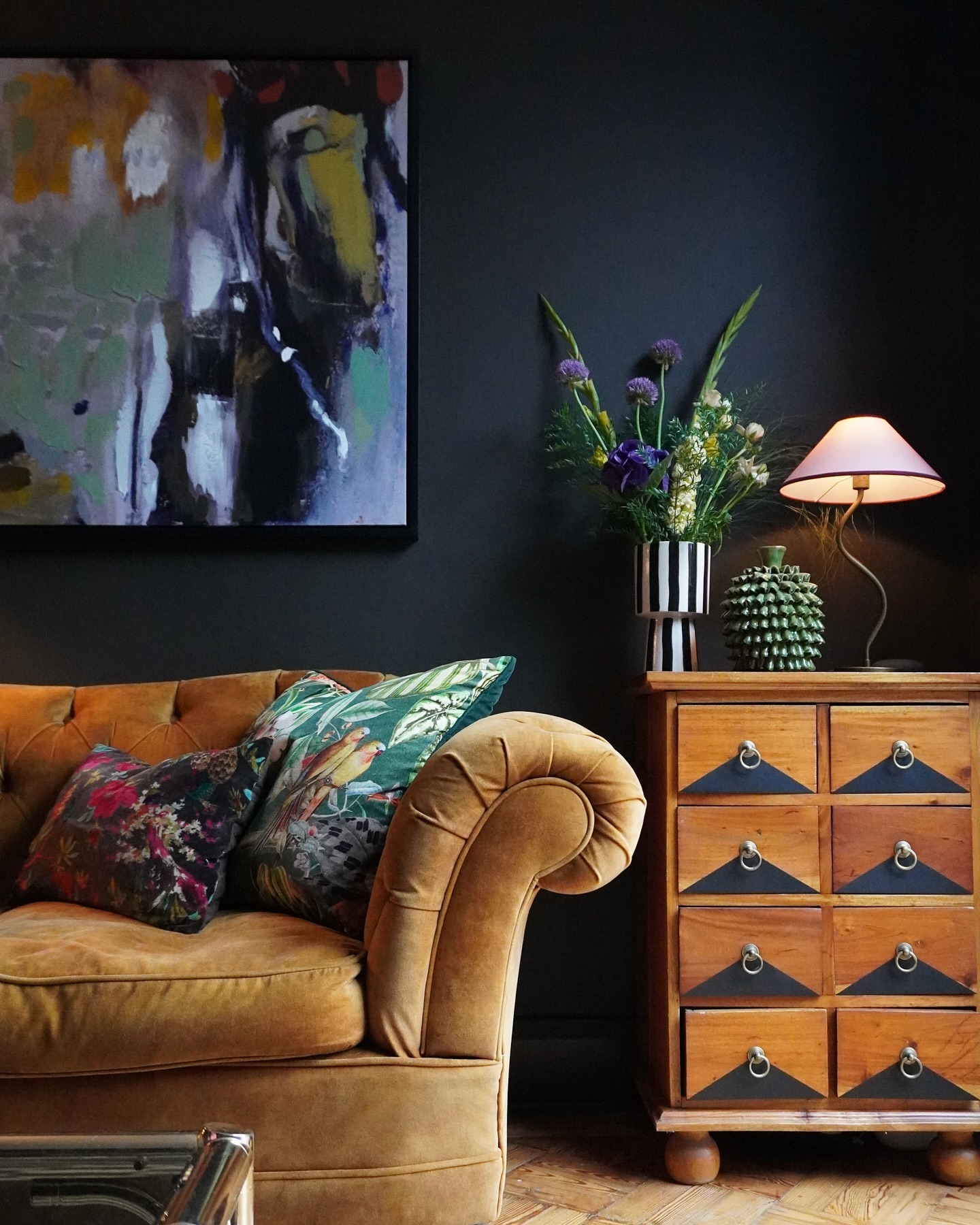 8. Add Silver Ring Pulls to a Cabinet Near Black Walls