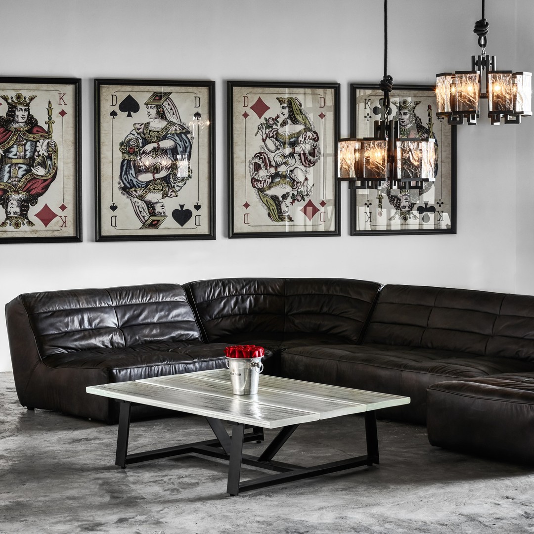 16. Brighten Black Leather With a Silver Flower Vessel