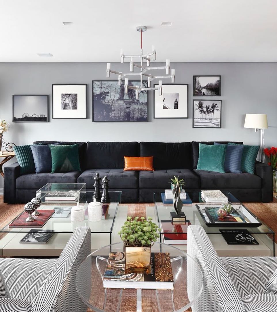 8. Stretch a Low Sofa Beneath Travel Photos